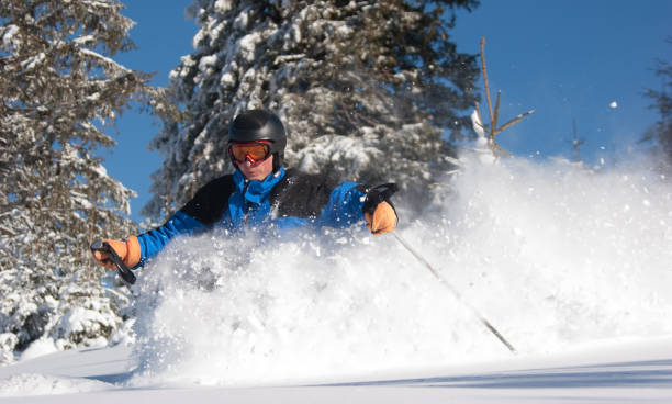 istock Skier  Carving in Fresh Powder Snow 157564758