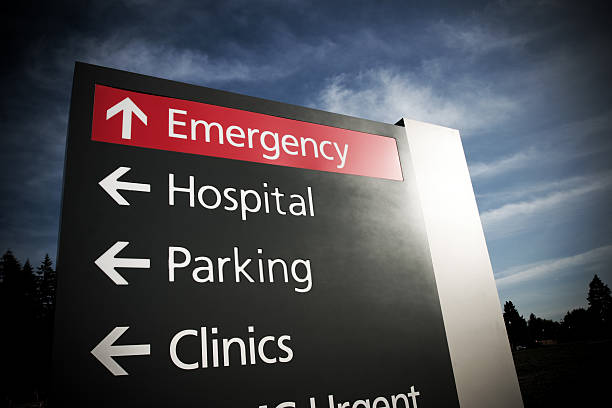 Hospital Emergency Sign with dramatic lighting stock photo