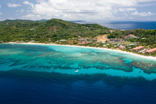 People enjoy snorkling and swimming at the beach Anse Lazio on Praslin Island, Seychelles.