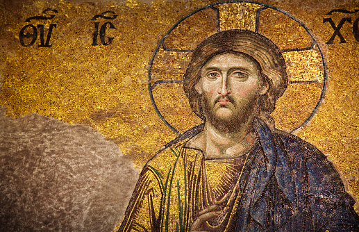 Detail of byzantine or orthodox mosaic icon depicting the head of an Angel.