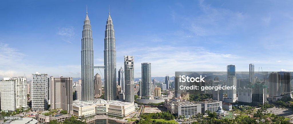Kuala Lumpur Skyline Panorama A panoramic cityscape of the downtown area of Malaysia's capital city, Kuala Lumpur, including the Petronas Twin Towers and other skyscrapers. Kuala Lumpur Stock Photo