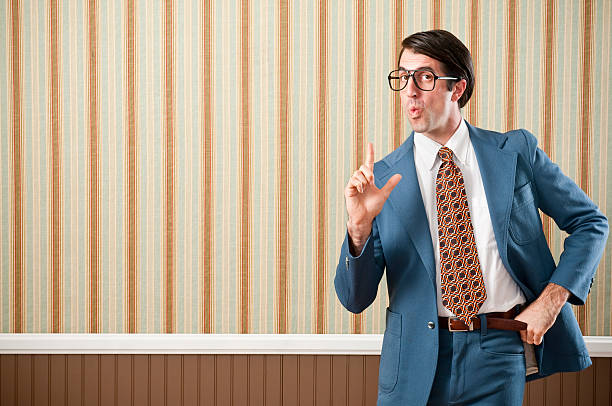 nerdy ビジネスマンにレトロなスーツ - smug ストックフォトと画像