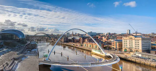 The millenium bridge spanning from Newcastle to Gateshead Quayside over the river Tyne.