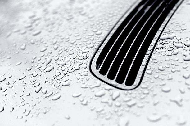 istock Water drops on a silver car hood 157567649