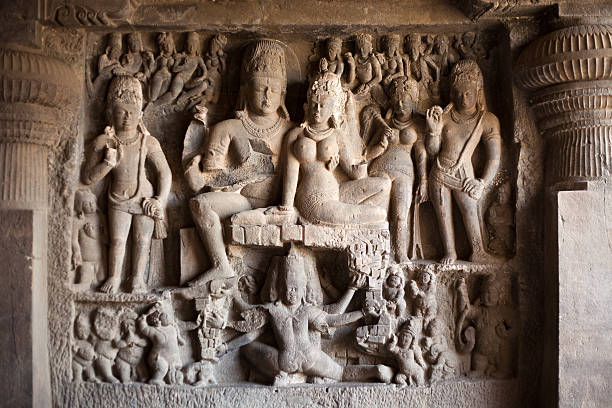 Buddhist Carving From The Ellora Caves From A Buddhist Carving Inside The Ellora Caves Near Aurangabad, India aurangabad maharashtra photos stock pictures, royalty-free photos & images