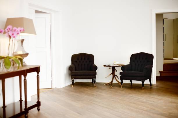 two chairs in a office two chairs in a office funeral home chairs stock pictures, royalty-free photos & images