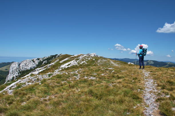 istock Senior woman hiking 1575682580
