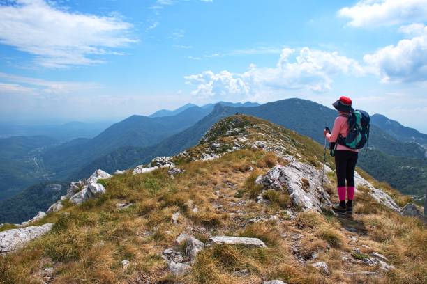 istock Senior woman hiking 1575682738
