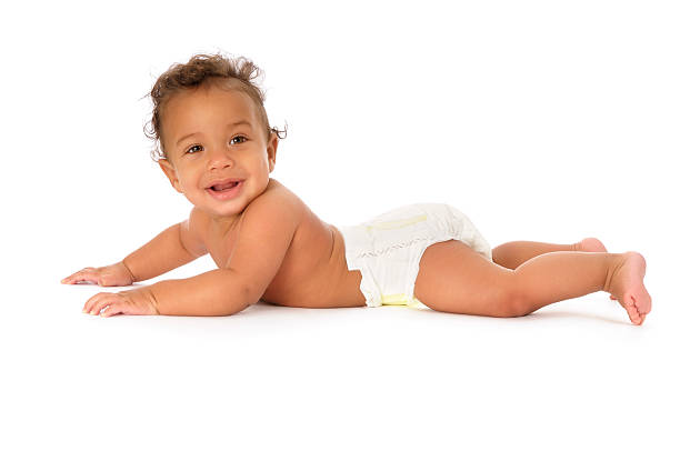 istock Baby On His Tummy Smiling 157568412