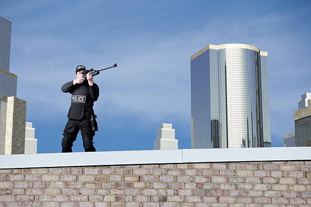 Police Sniper roof stock photo