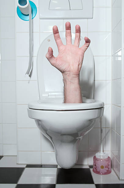 istock Hand out of the toilet 157568767
