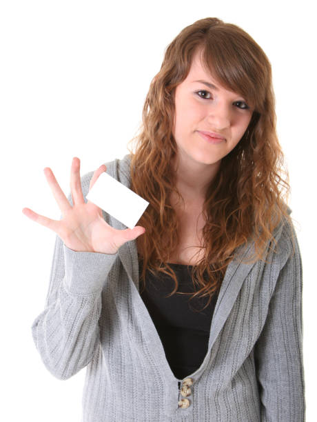 istock young womand holding blank business card 157568811