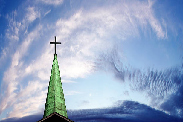 XXXL cross and steeple cross and church steeple at sunset (XXXL) steeple stock pictures, royalty-free photos & images