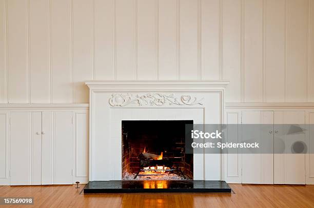Traditonal Fireplace In Empty Room Stock Photo - Download Image Now - Fireplace, Mantelpiece, Wall - Building Feature