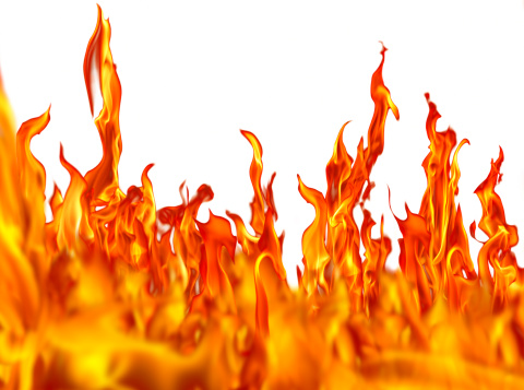 Actual Photograph of fire flames isolated over white.