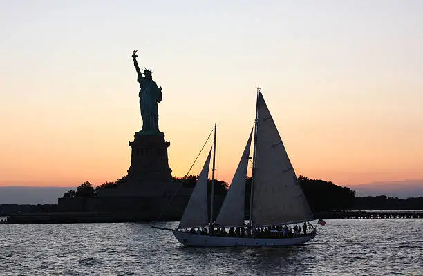 Photo of Statue of Liberty at Sunset