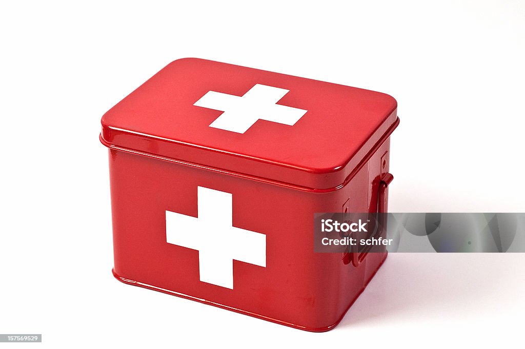 Red first aid box on white background A red metal first aid box on white background First Aid Kit Stock Photo