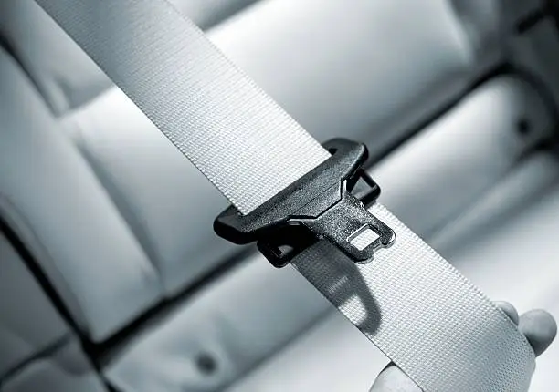 belt in a luxus car, fokus is under the locking unit