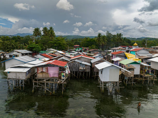 Stilt Houses over the sea in Zamboanga. Philippines. Squatter Stilt Houses of fishermen over the sea in Zamboanga del Sur. Mindanao, Philippines. zamboanga del sur stock pictures, royalty-free photos & images