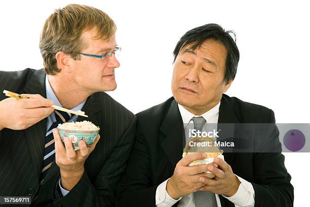 Cultural Exchange Stock Photo - Download Image Now - Eating, Hamburger, Men