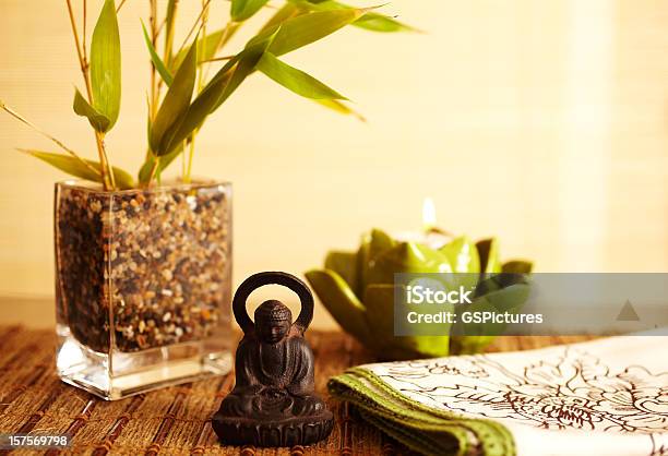 Home Decor Still Life Of Bamboo In Vase And Buddha Stock Photo - Download Image Now