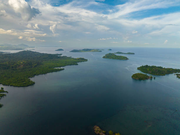 Once Islas in Zamboanga City. Philippines. Drone view of cluster of islands and islets of Once Islas. Blue sea with blue sky and clouds. Zamboanga. Mindanao, Philippines. zamboanga del sur stock pictures, royalty-free photos & images