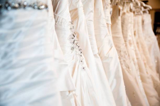 istock wedding dresses in a bridal store 157570276