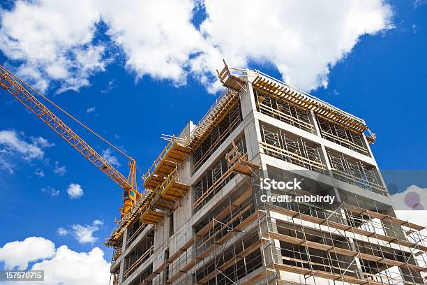 Construction Machinery Stock Photo - Download Image Now - Apartment, Architecture, Blue