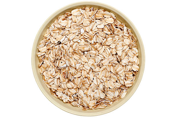 istock bowl of oatmeal flakes 157571033