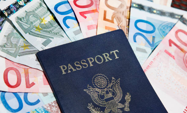 istock US Passport with Euro Bills 157571210