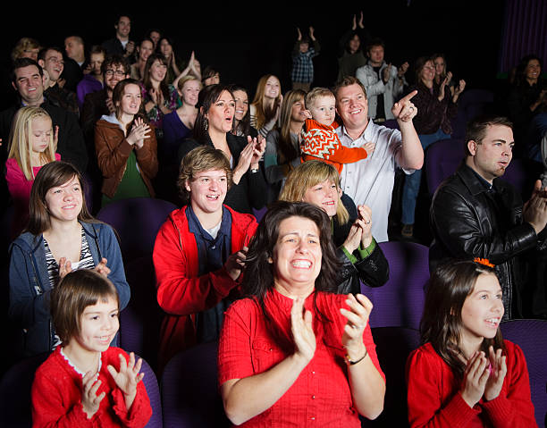 istock Standing Ovation in a Movie Theater 157571329