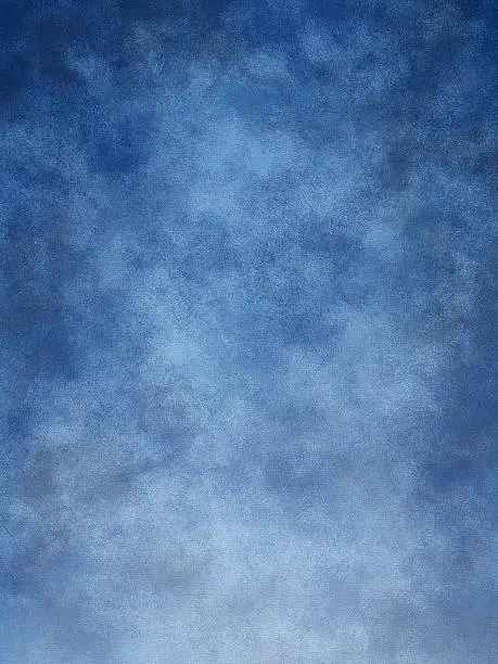 Mottled blue muslin type background.