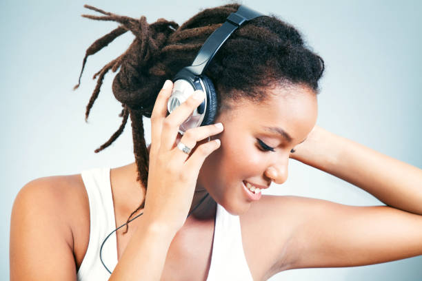 istock Young Woman With Headphones 157571625