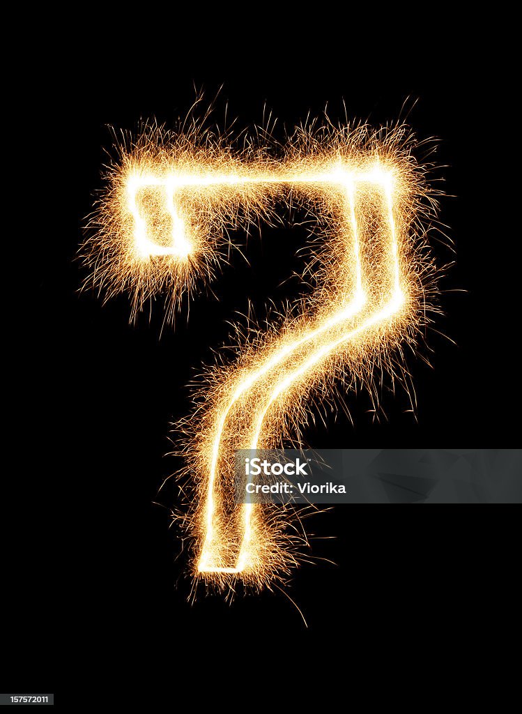 Sparkling Number 7 Sparkling number 7 on a pure black background. Firework Display Stock Photo