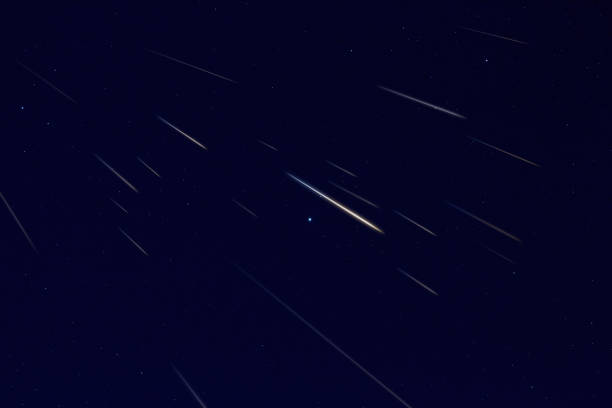 istock Meteor shower and shooting stars with Milky Way. 1575721178