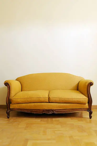 Photo of Vintage Yellow Sofa. Copy Space