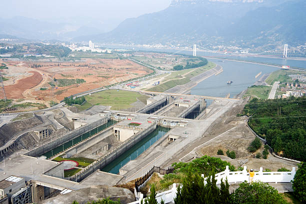 The Locks at Three Gorges Dam A downriver view of the first two steps of the five-step lock complex at the Three Gorges Dam on the Yangtze River in China. three gorges photos stock pictures, royalty-free photos & images