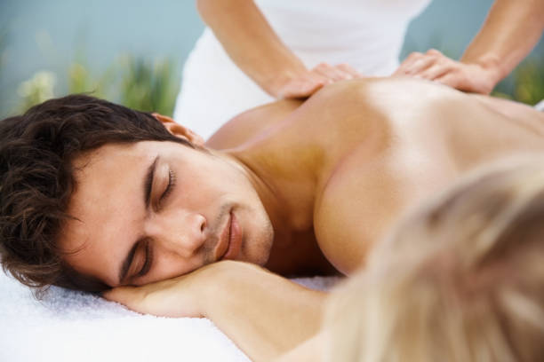 istock Relaxed handsome man receiving back massage 157572756
