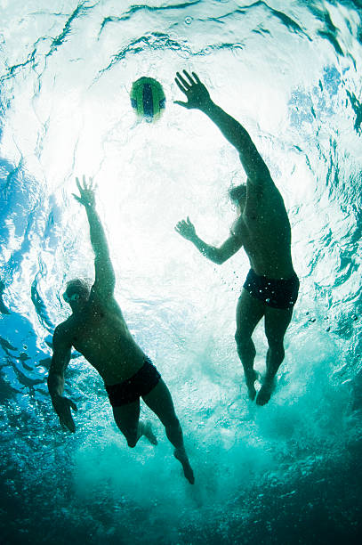 water-polo - floating on water swimming pool men water fotografías e imágenes de stock