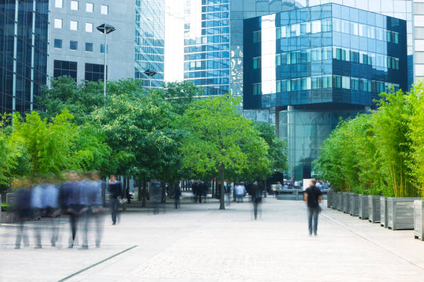 Business People Walking in Modern Financial District
