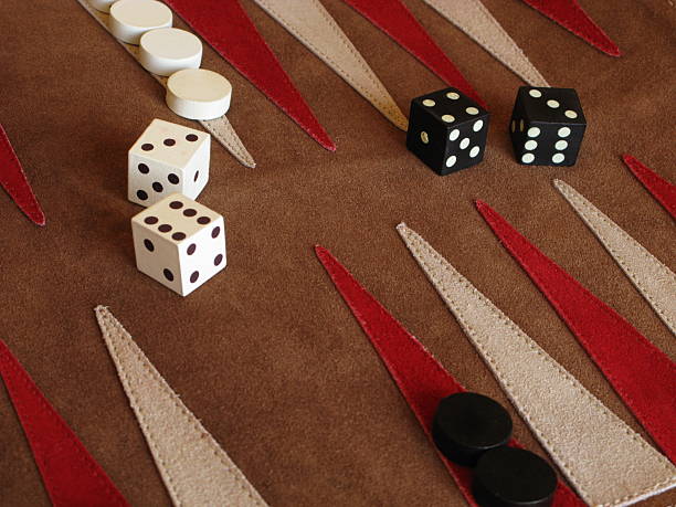 Backgammon Board Game Dice Close up of suede backgammon game board. backgammon stock pictures, royalty-free photos & images