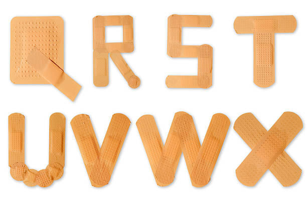 Band aid alphabet (clipping paths) stock photo