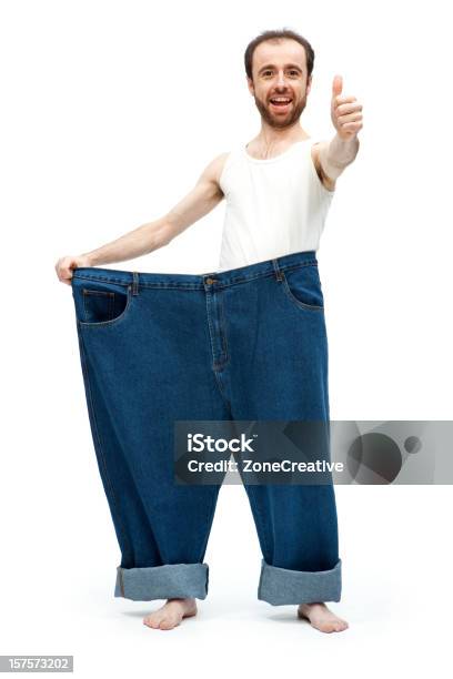 Very Slim Man And His Large Pants Stock Photo - Download Image Now - Achievement, Activity, Aspirations