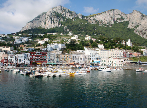 Capri Island Landscape, Marina Grande harbour and mountains.
