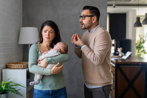 istock Couple having conflict financia problem postpartum depression. Marriage difficulties divorce concept 1575733582