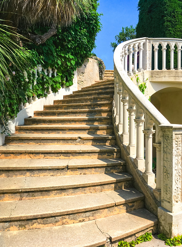 Old curved staircase leading to formal garden, Saint-Jean-Cap-Ferrat, Côte d'Azur, France