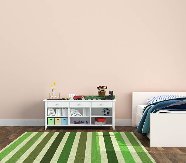 istock Furnished kids room with salmon colored walls 157575501