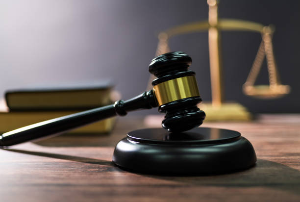 istock Gavel and scales of justice on the table 1575769549