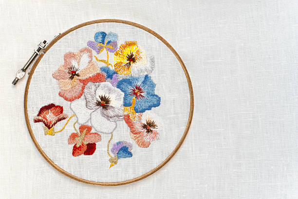 Embroidery with pansy pattern stock photo