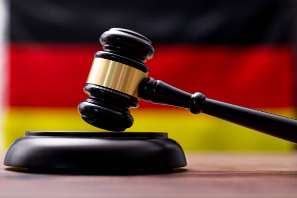 istock Wooden gavel and German flag 1575772177